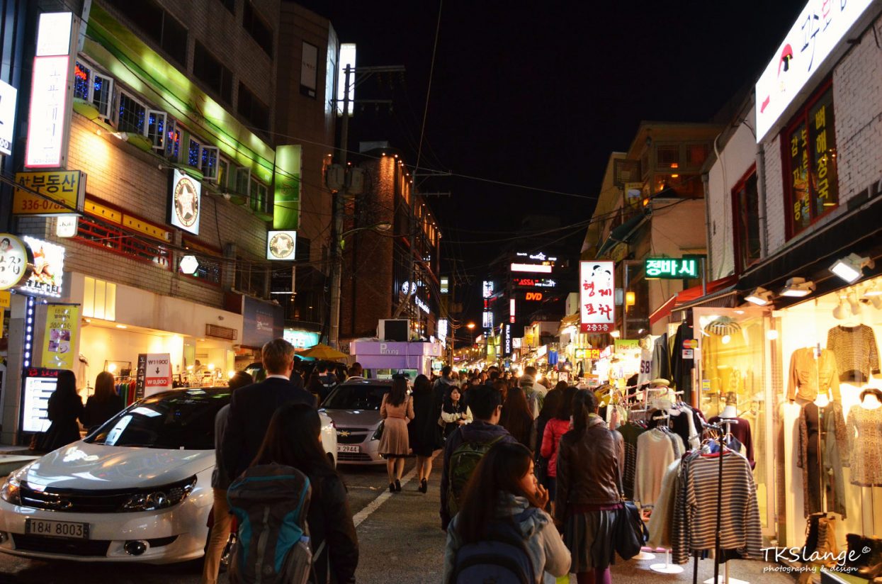 Busy streets at night in Hongik area in Seoul.